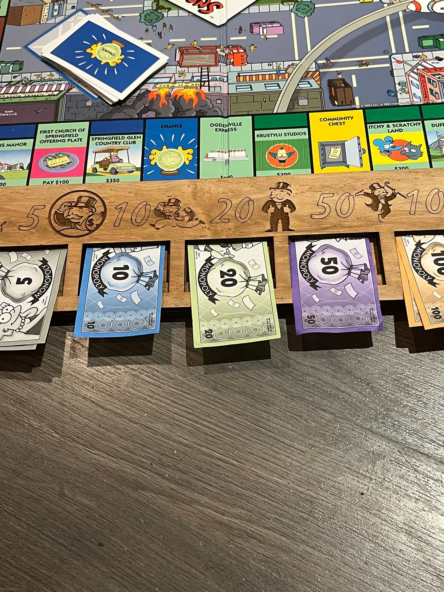 Monopoly board frame with banker tray