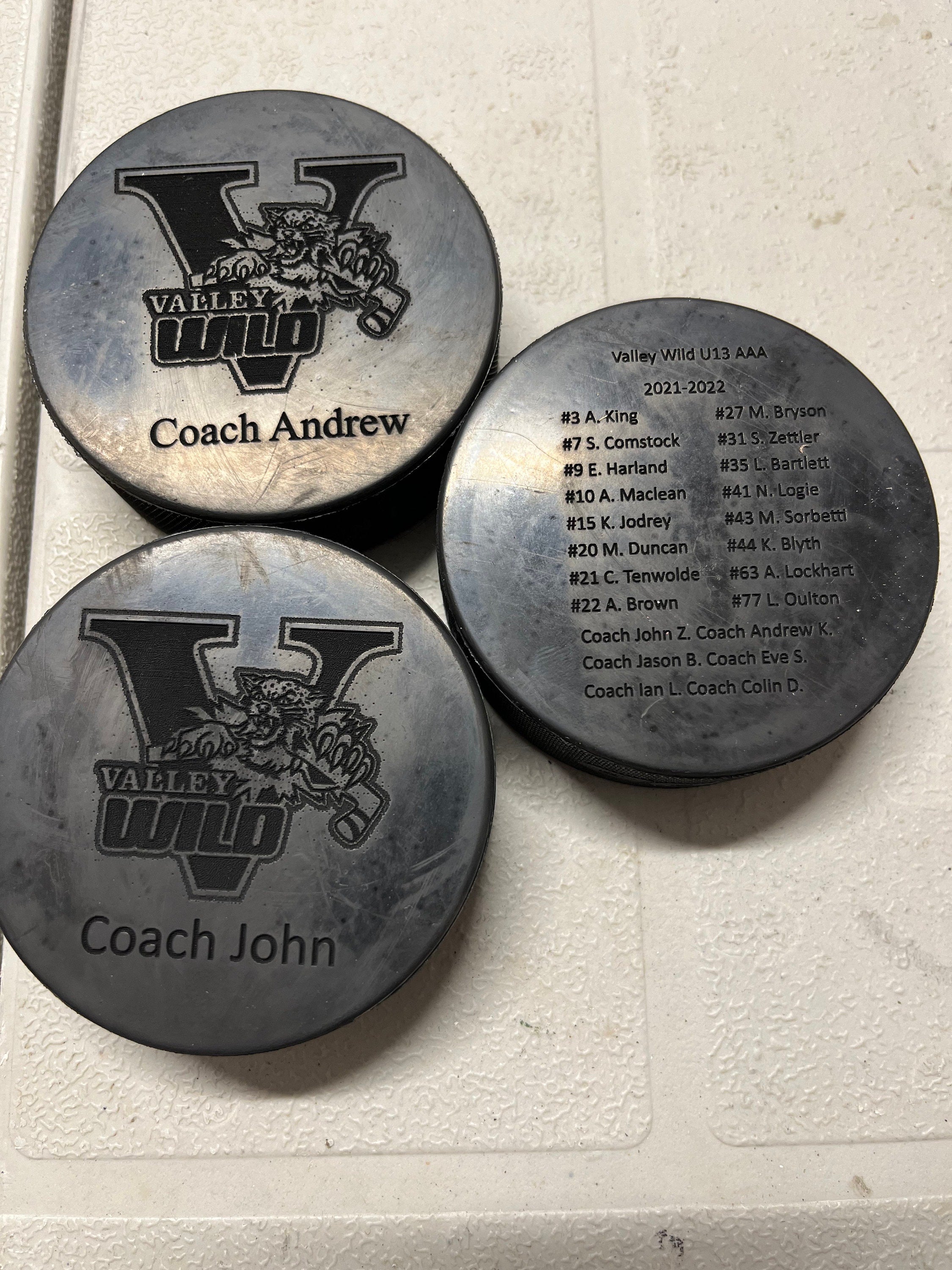 Personalized custom Engraved hockey pucks