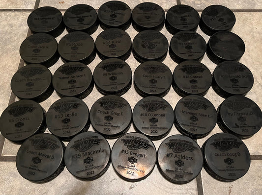 Custom Engraved hockey pucks (full team and coaches)