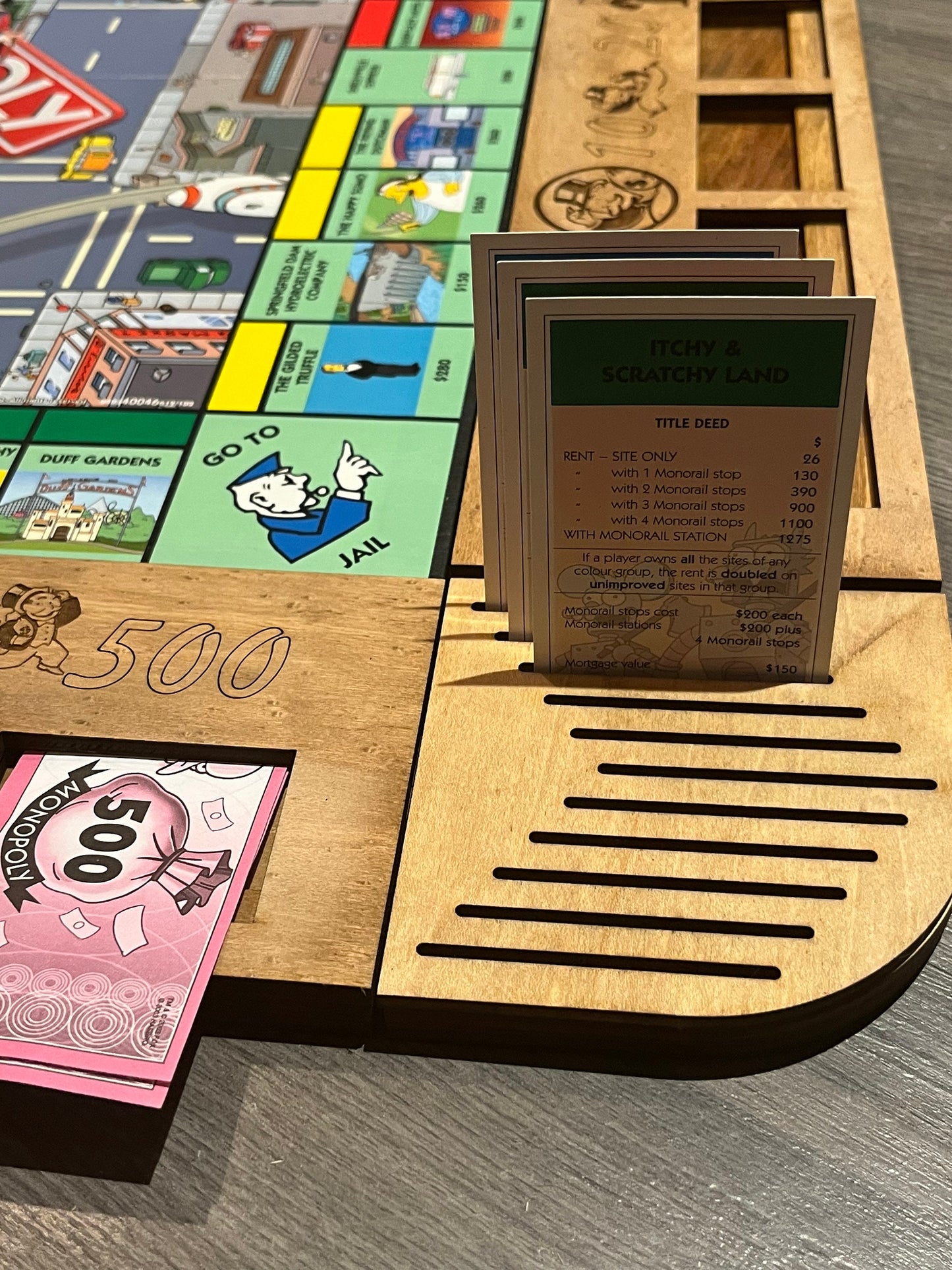 Monopoly board frame with banker tray