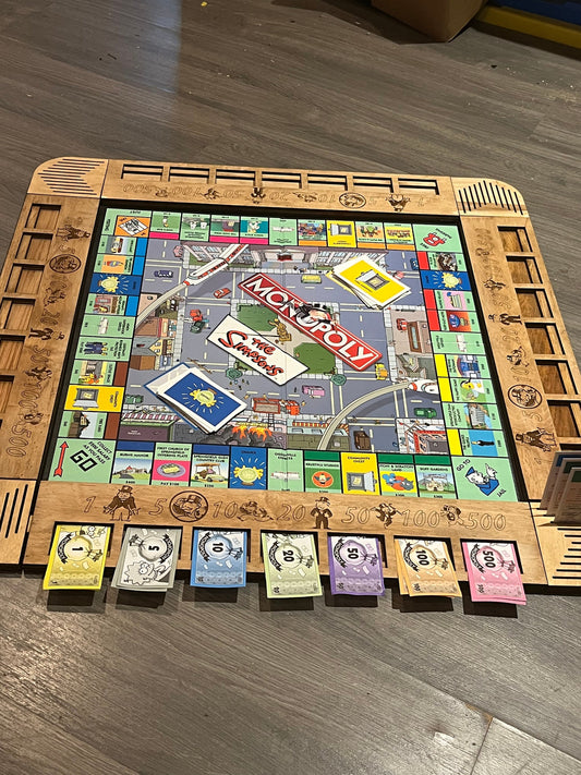 Monopoly board frame with banker tray
