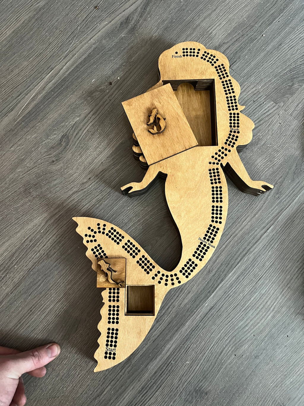 Mermaid shaped cribbage board
