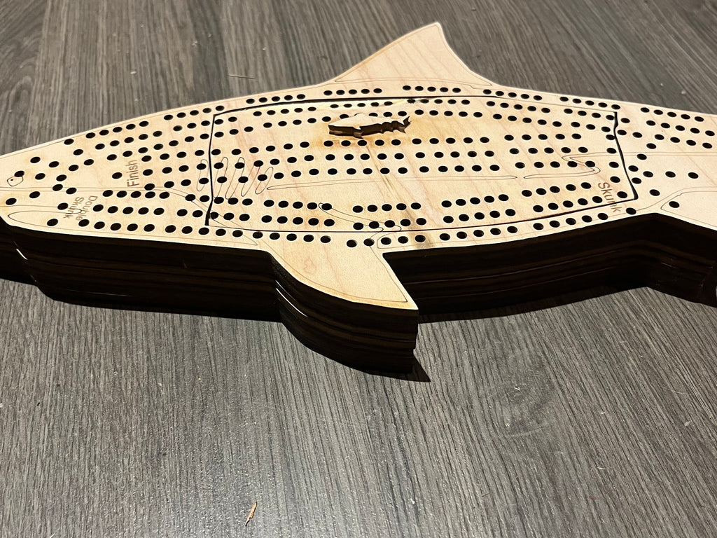 Custom Ocean animal cribbage boards.