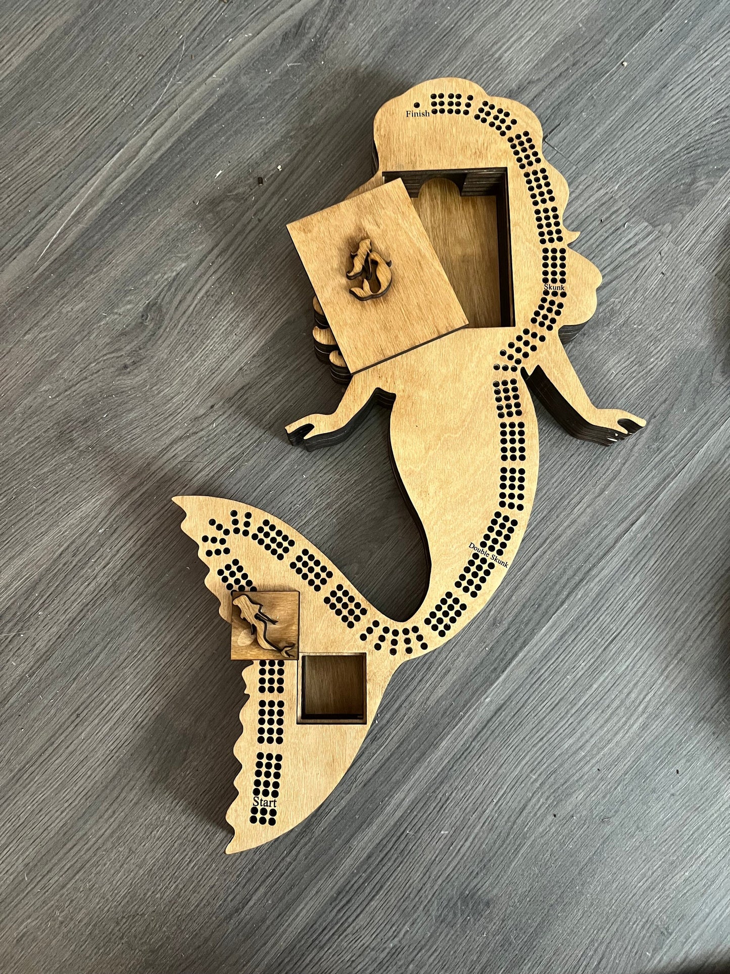 Mermaid shaped cribbage board