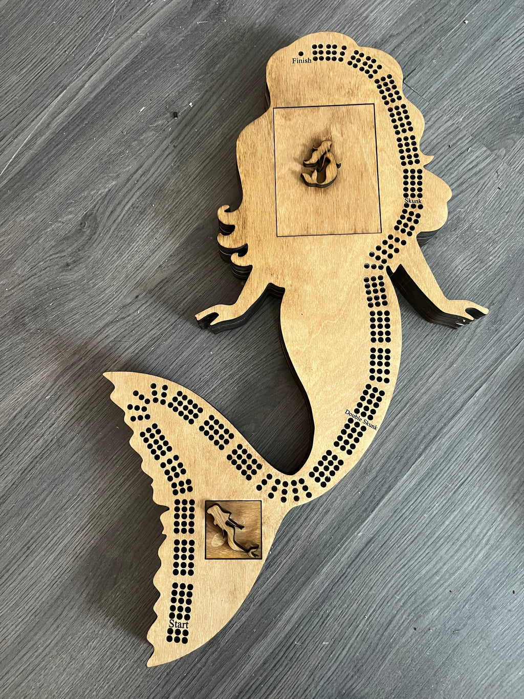Mermaid shaped cribbage board