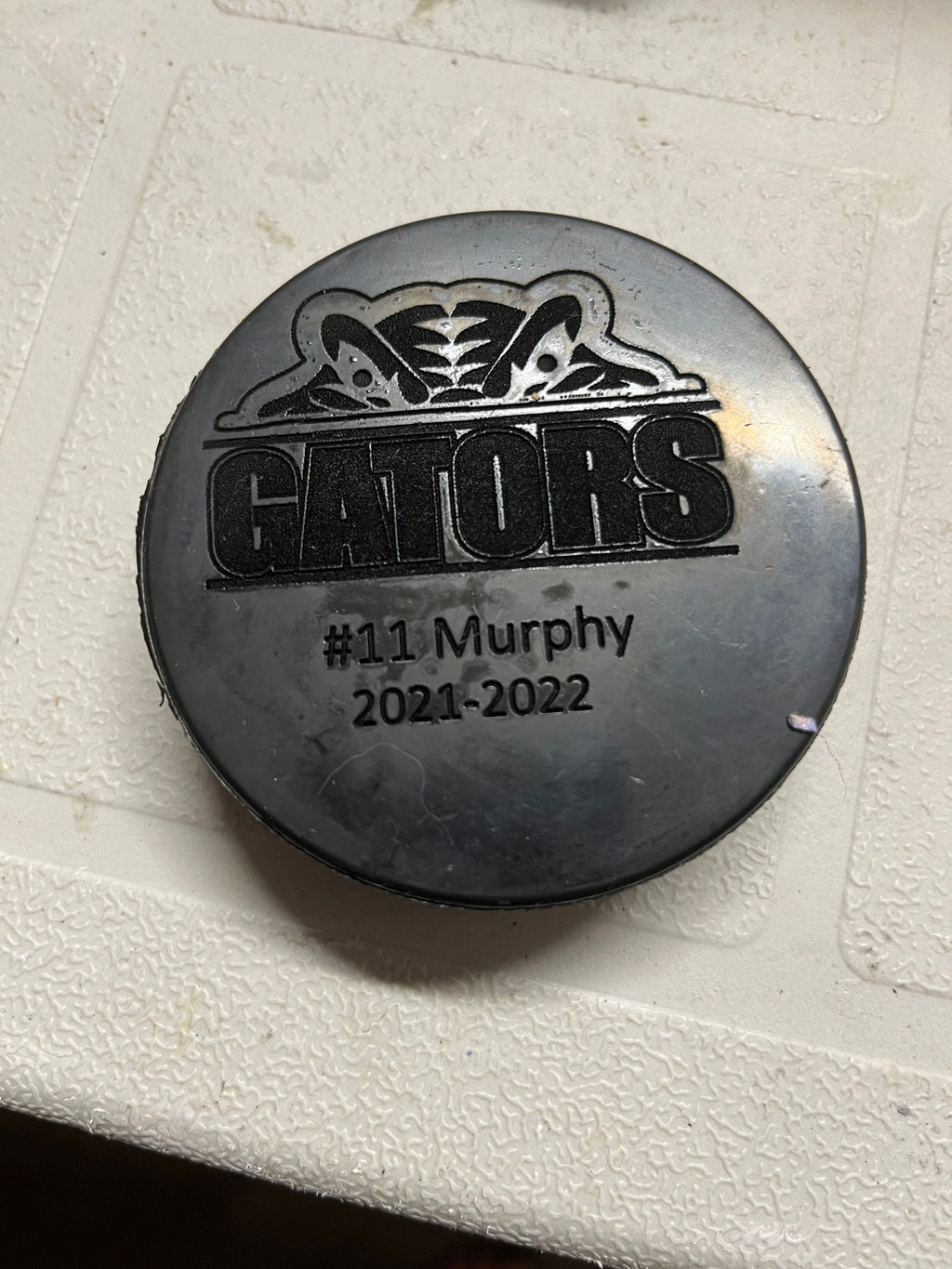 Custom Engraved hockey pucks (full team and coaches)