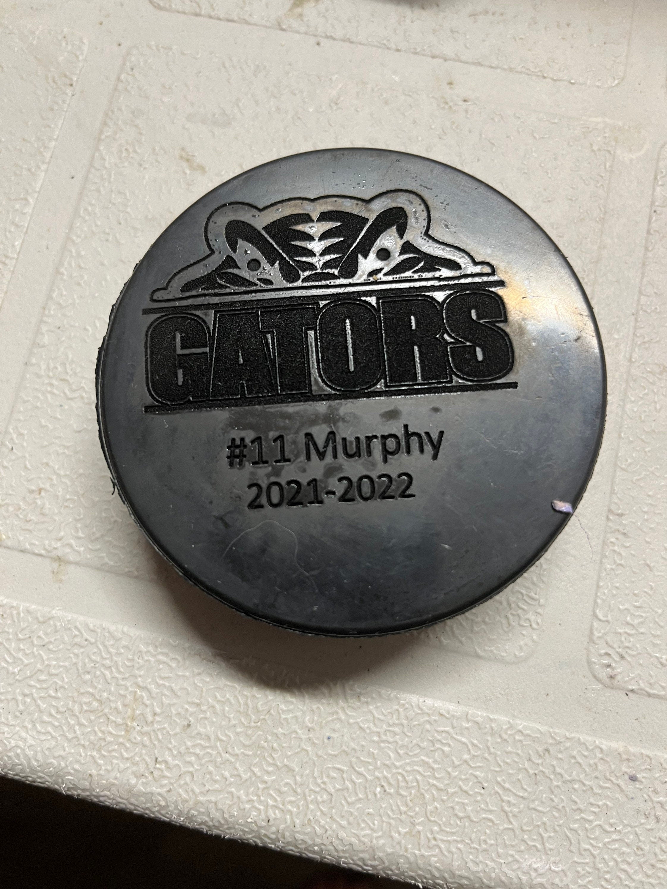 Custom Engraved hockey pucks (full team and coaches)