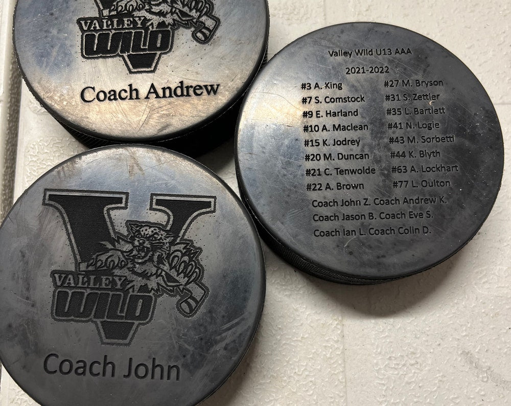 Personalized custom Engraved hockey pucks